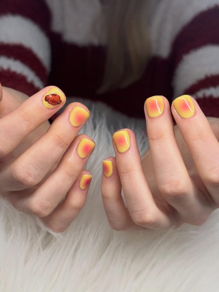 Sunset-coloured short manicure credited to Your Nail Crush